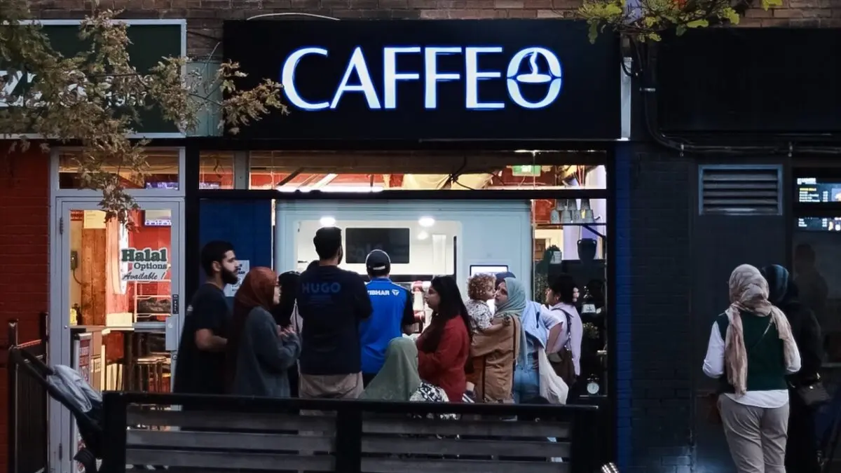 Evening queue at Caffeo, an unattended robotic coffee storefront in Toronto