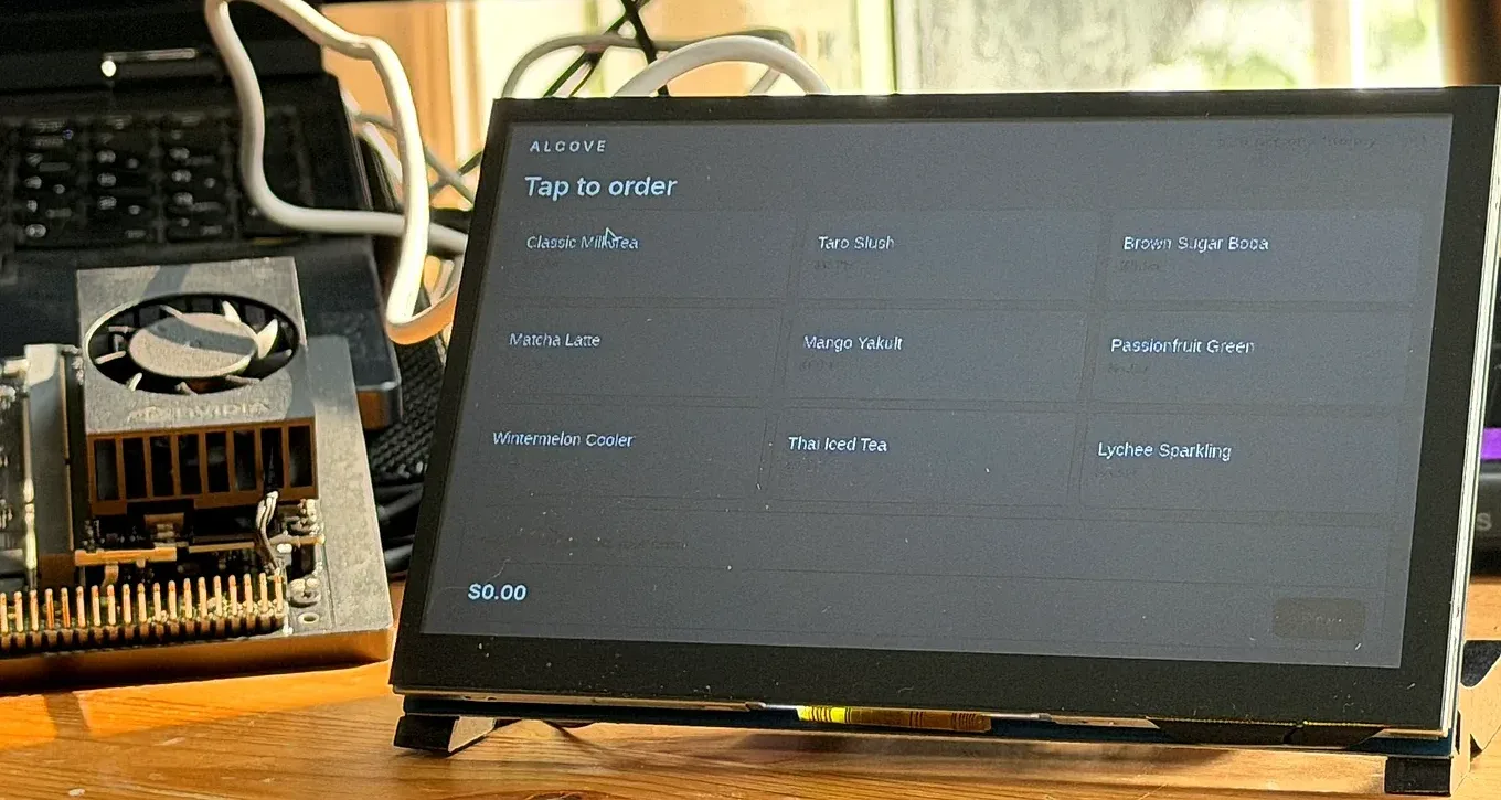 The bench unit showing the fresh-drink order menu, a grid of drink options under a Tap to order heading.