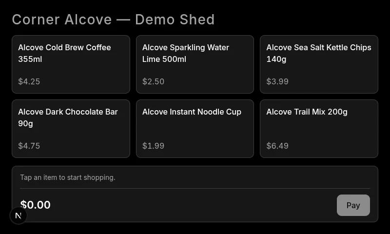 Kiosk touchscreen showing a six-item shelf grid with prices and a Pay bar reading $0.00
