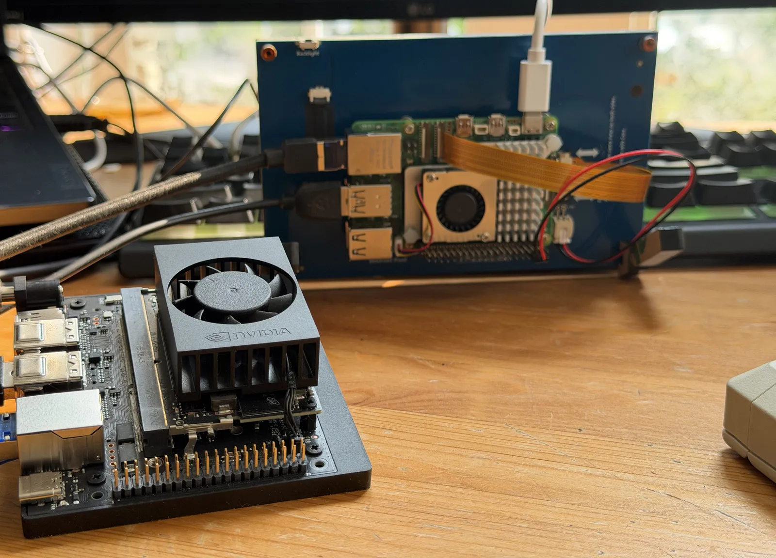 Detail of the board assembly on the display back-panel, ribbon looped to the display connector
